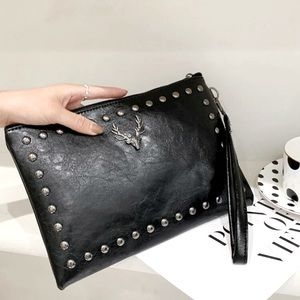 Faux leather hand clutch with wrist strap New